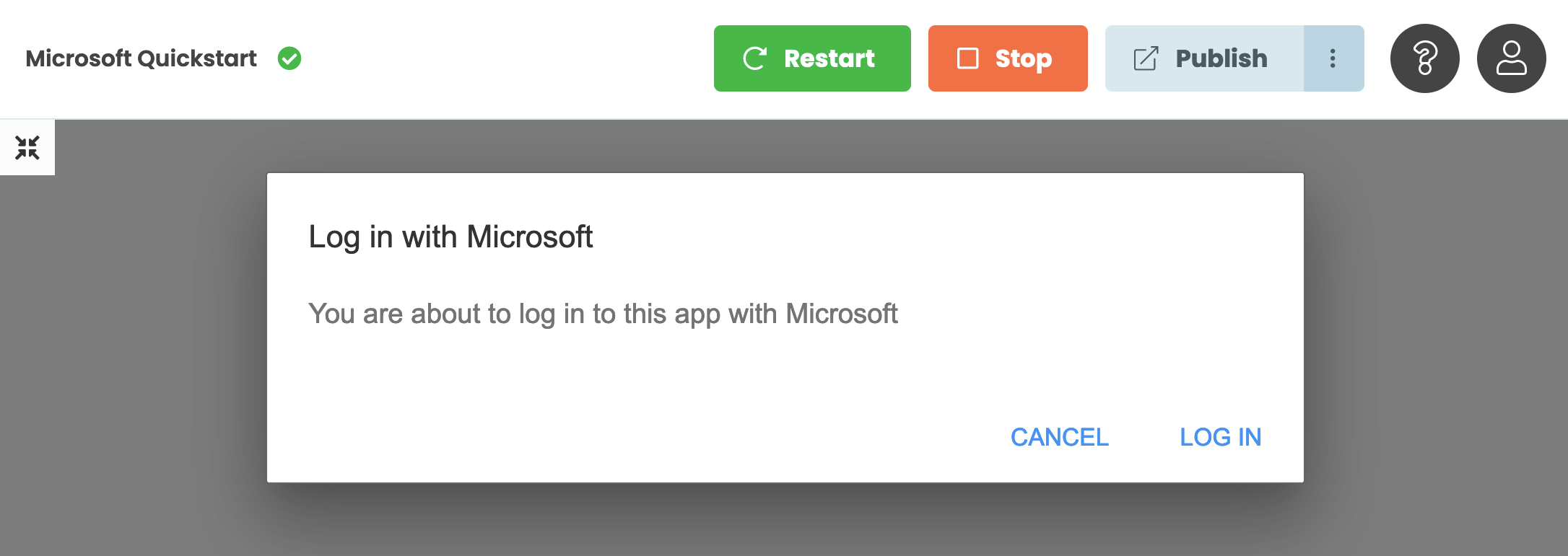 A running app showing a dialog with 'cancel' and 'log in' buttons, and a message informing you you are about to log in with Microsoft.